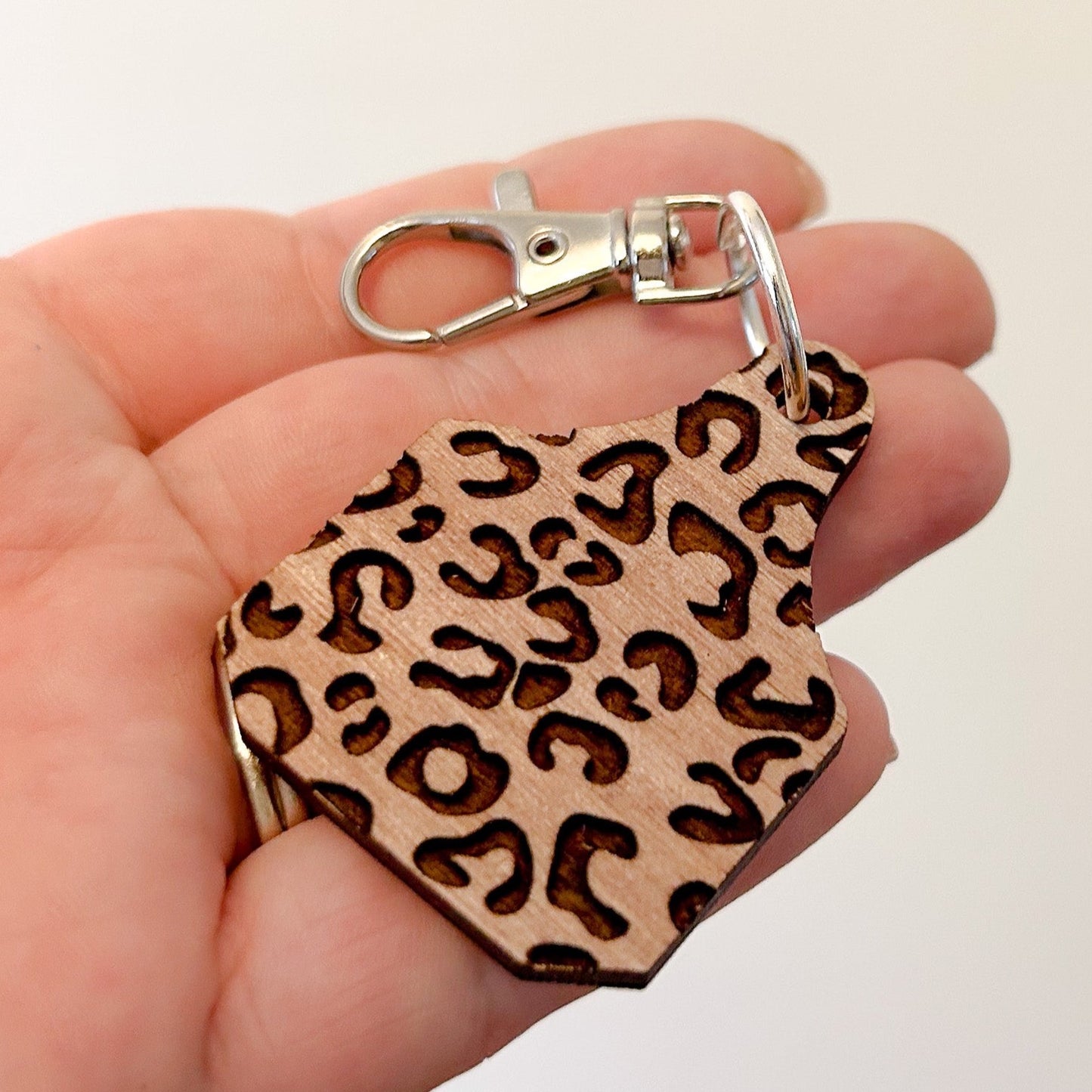 Leopard Engraved Cow Tag Keychain